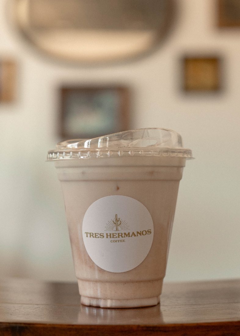 The Churro latte in a branded cup